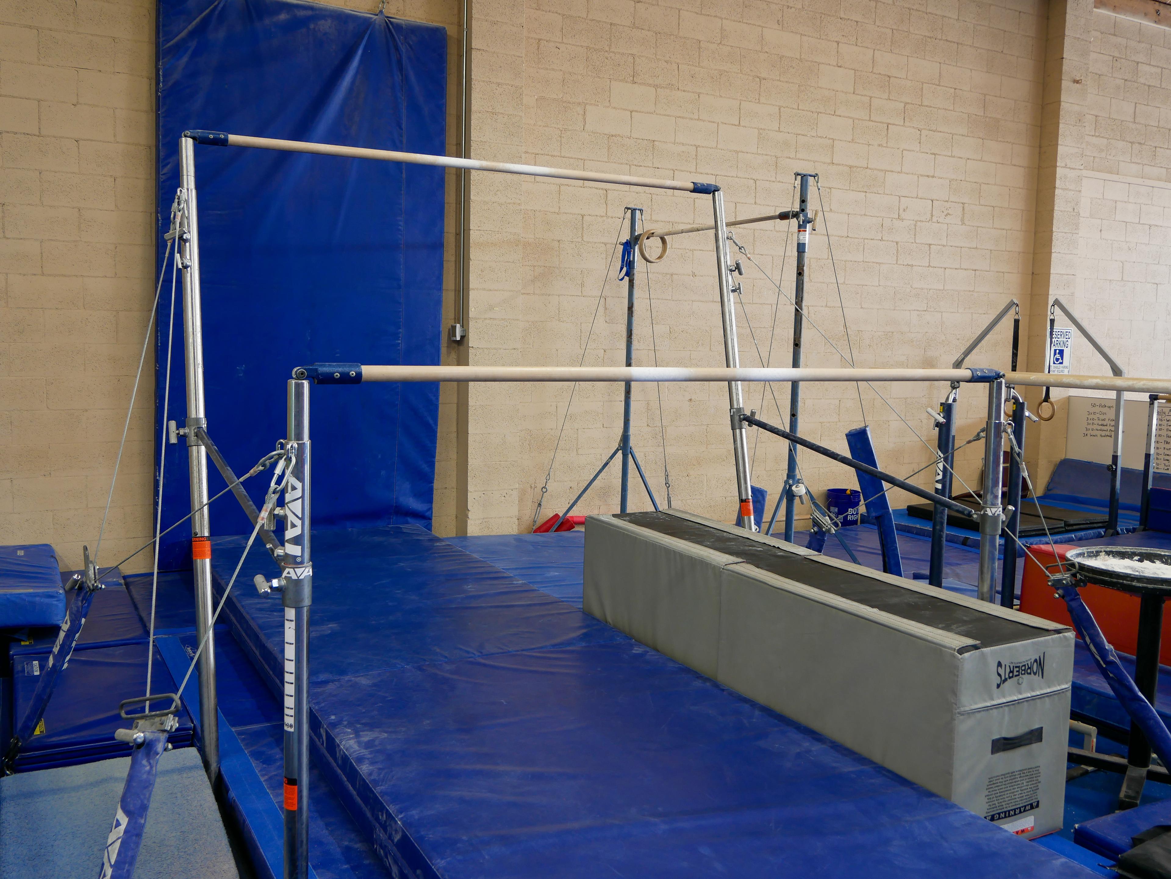 Gymnast training on bars at Shasta Gymnastics Academy